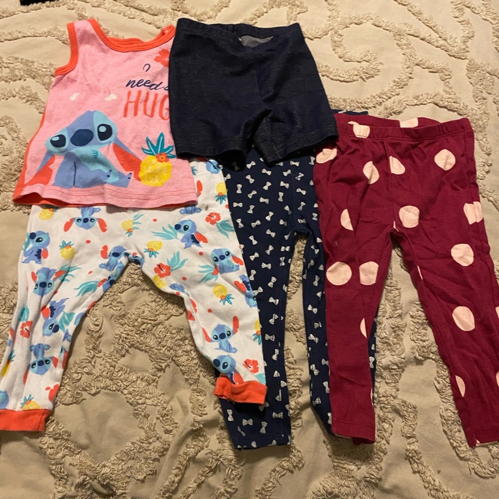 3 pairs of pants one pair of shorts and stitch tank top warn once or twice